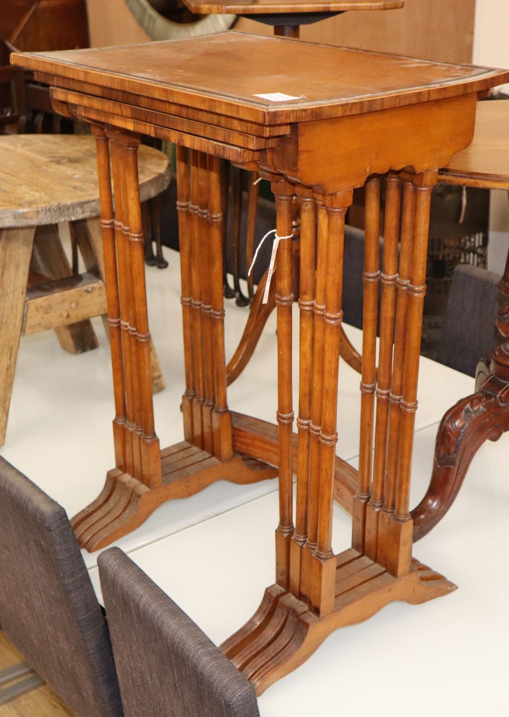 A nest of 19th century satinwood and rosewood banded quartetto tables, W.50cm D.34cm H.69cm